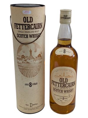 an image of a bottle of old fettercain scotch whisky next to a cardboard box