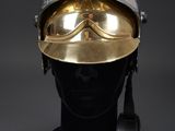 a close up of a helmet on a mannequin head