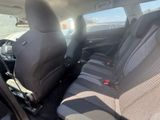 the back seats of a car are empty in the sun