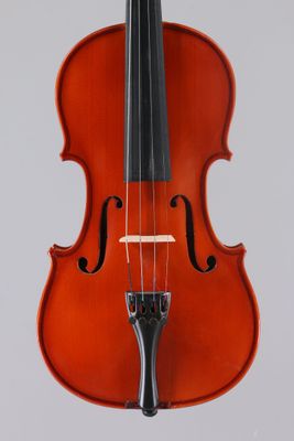 an orange violin with a black bow on a white background