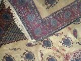 a carpet that has a lot of different colors and patterns on it
