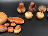 many different types of nuts on a black surface