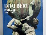 un livre sur lequel figure l'image d'une statue tenant une balle