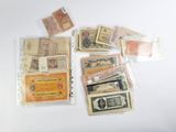 many different types of paper money on the table