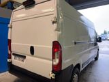 a white van that is parked in a garage