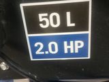 a close up of a sign on the side of a blue car