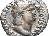 a silver coin with an image of a man on it