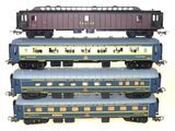 three trains are stacked on top of each other on a white surface