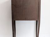 an image of a small table with a drawer on it