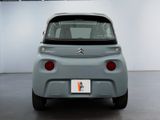 a small car that is parked in a room