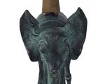 a statue of an elephant with a cone on it ' s head