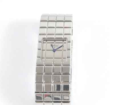 an image of a close up of a wrist watch on a white surface