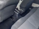 two seats in the back of a car that are empty