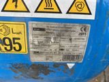 an image of a blue gas tank with warning signs on it