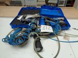 a blue case with a bunch of wires in it on a table