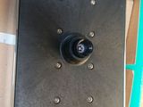a picture of a box with a camera attached to it