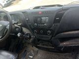 a picture of a dashboard of a car with a steering wheel