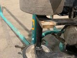 a close up of a machine that is sitting on the ground