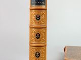 a book that is sitting on a table next to a book