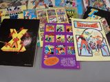 a lot of comic books on the table