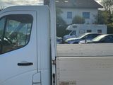 a white truck that is parked in the parking lot