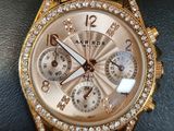 michael korsch rose gold chronograph watch with diamond bezel