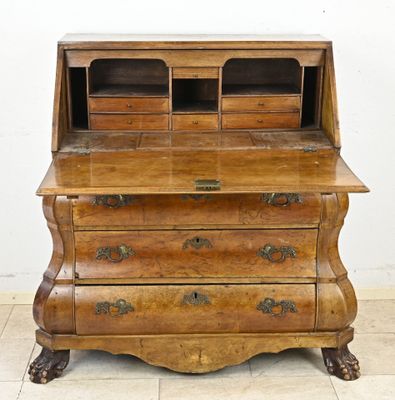 a wooden desk with a drawer on top of it