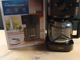 a coffee maker that is sitting on a table
