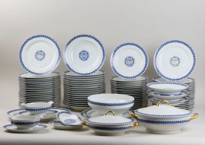 many plates and bowls with blue and white designs on them