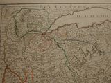 an old map of the middle of europe with a red line in the middle of the map