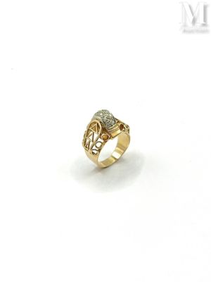 a close up of a gold ring with diamonds on a white background