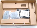 a box with a keyboard and a mouse inside of it