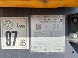 a close up of a license plate on the back of a tractor