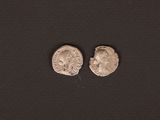 two roman silver coins, one of which has a head of a man and the other of a woman