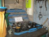 a suitcase full of tools sitting on a workbench