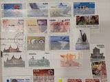 a picture of a refrigerator with many different stamps on it