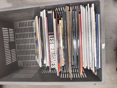 a box with a bunch of books inside of it