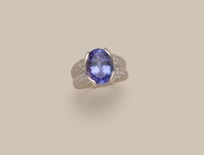 an oval tanzane sapphire and diamond ring