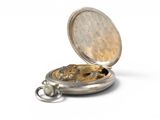a silver pocket watch with a chain on a white background