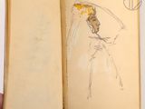 an open book with a drawing of a woman in a wedding dress