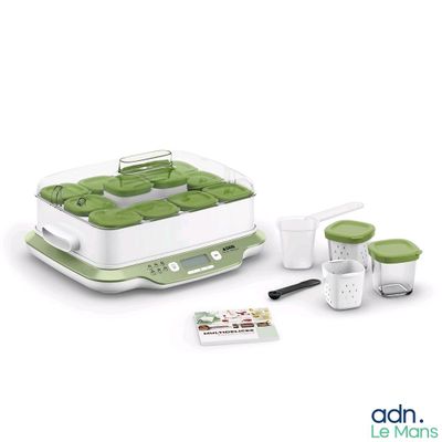 une photo d'un ensemble de cuisine vert et blanc