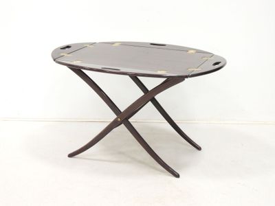 an image of a small table with a tray on it