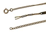 two pieces of gold chain with a clasp on a white background
