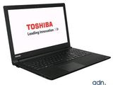 laptop with toshiba logo on screen on white background