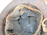 a helmet with a hole in the middle of it