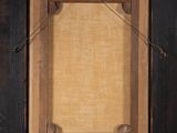 an old picture frame hanging on a wall with a rope