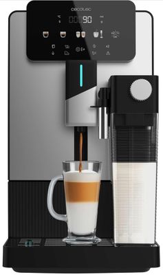 a close up of a coffee machine with a cup of coffee