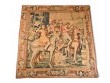 une image représentant une tapisserie sur laquelle figurent un homme à cheval et une femme à cheval
