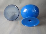 a blue plastic object with a hole in the middle