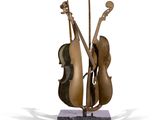 sculpture of a violin and a violin stand on a marble base
